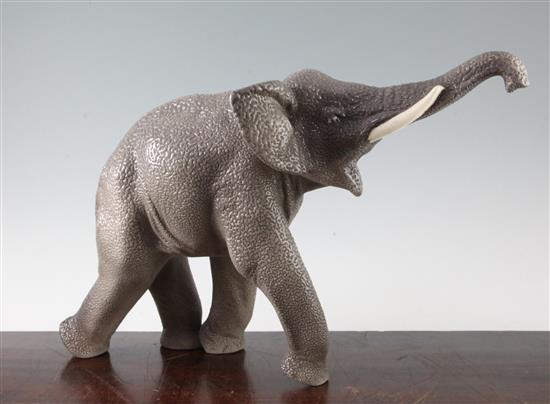 A Sevres Vinsare model of a trumpeting elephant, L.18in.